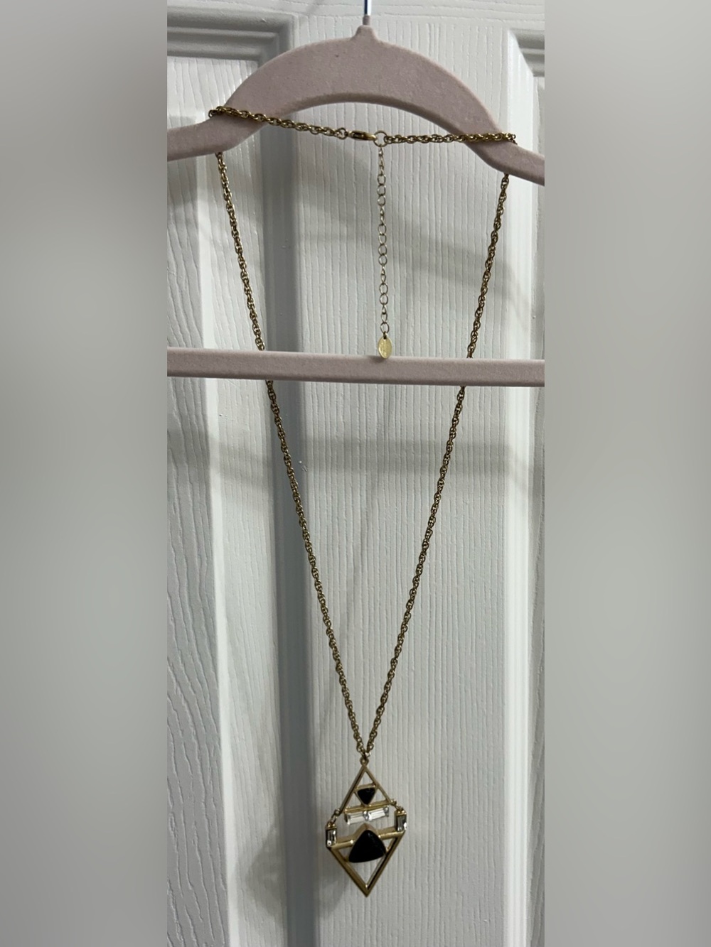 Gold-Tone Geometric Pendant Necklace with Black Accents